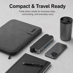The world’s smallest foldable laptop stand with integrated USB hub—designed for modern mobile work.