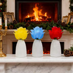 Three blooming rose lamps on a fireplace mantel