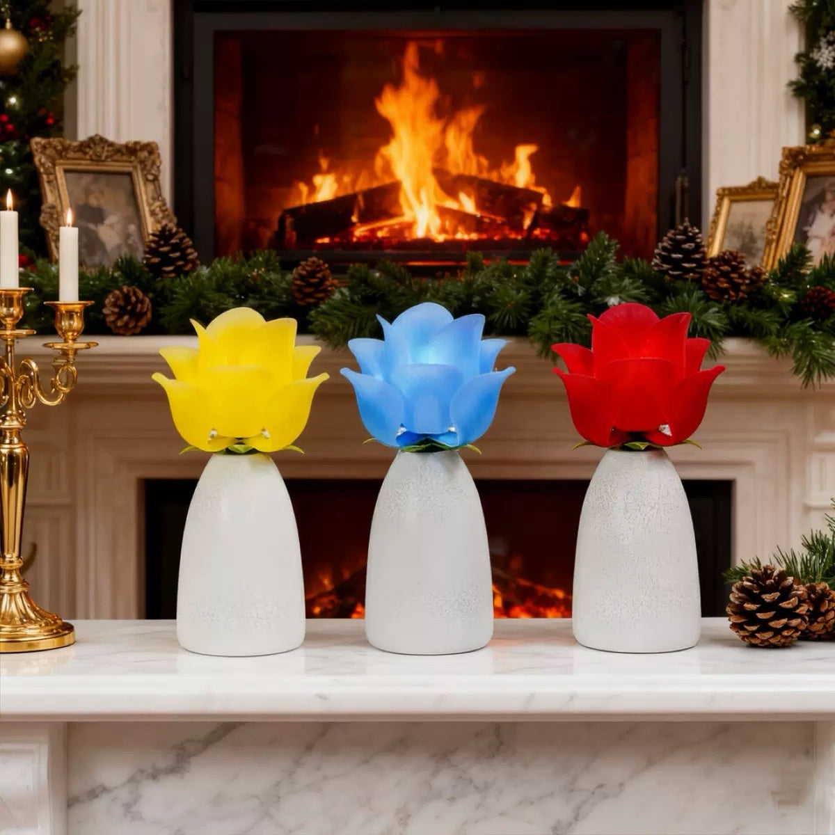 Three blooming rose lamps on a fireplace mantel
