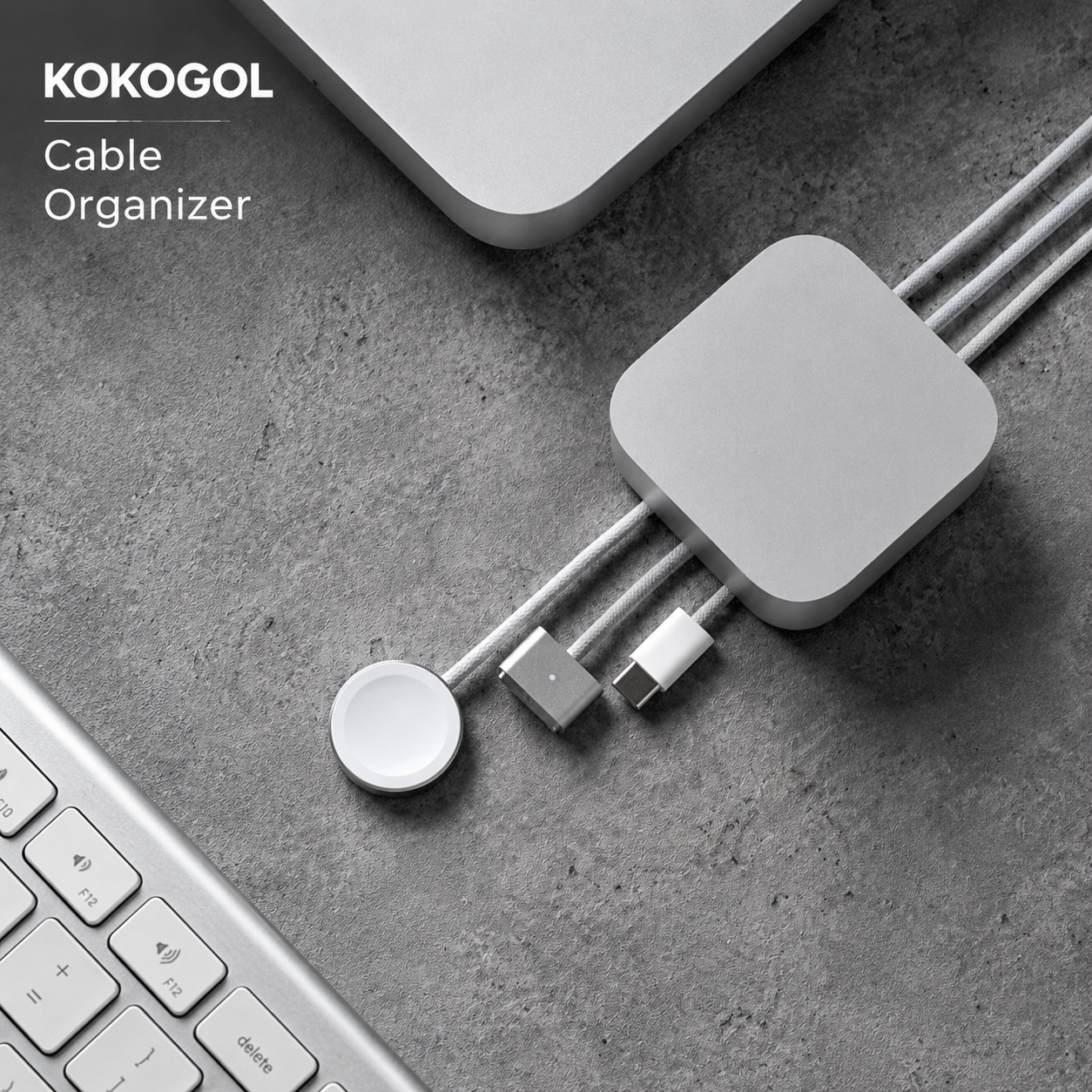 Cube Mini holding USB-C, magnetic phone and watch charging cables