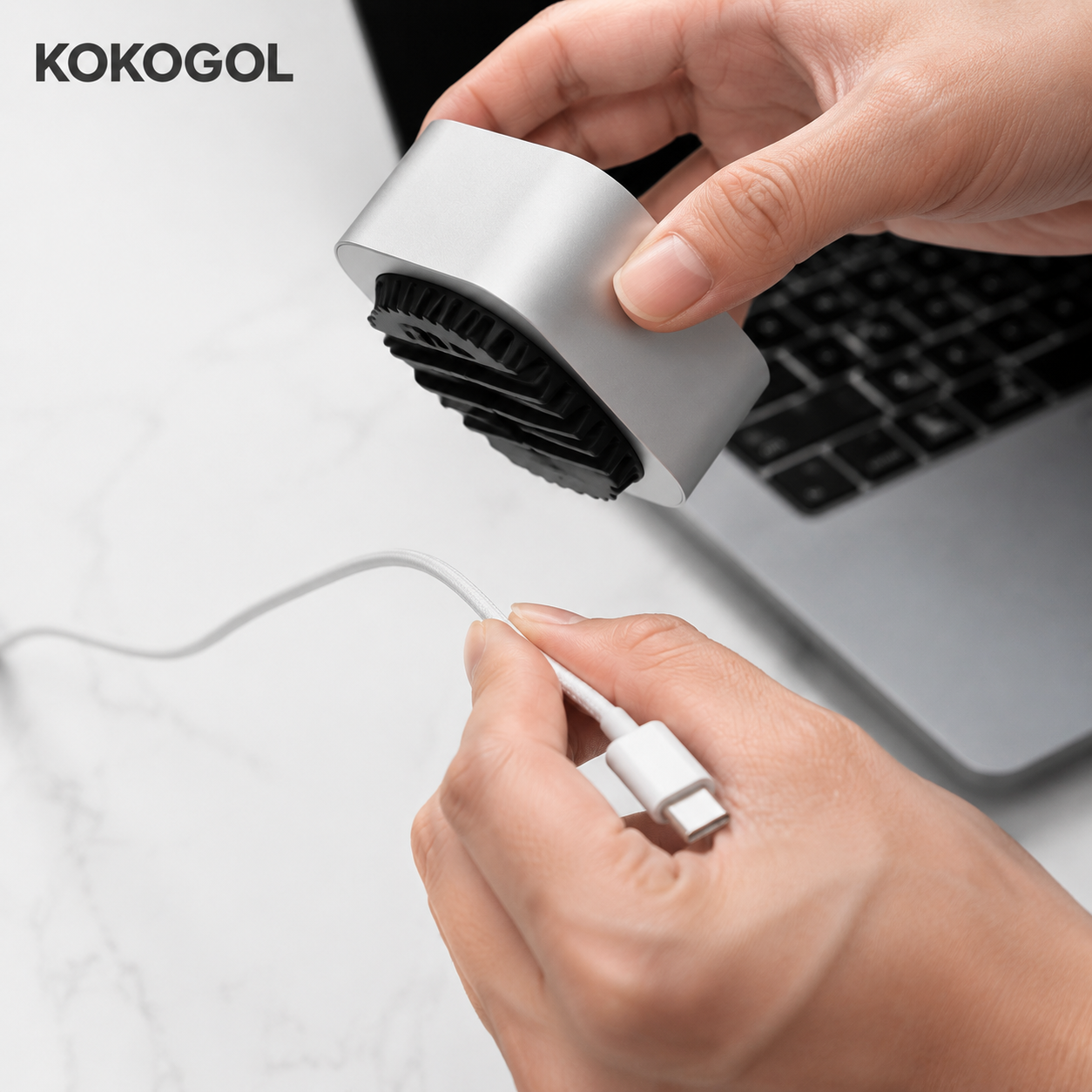 Cube Mini keeping multiple charging cables neatly aligned on a desk