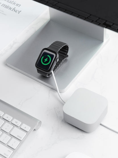 KOKOGOL Cube Mini Cable Organizer on white desk with Apple Watch charging and iMac keyboard in background