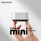KOKOGOL_Cube_Mini_Cable_Organizer_held_in_hand_compact_aluminum_alloy_design