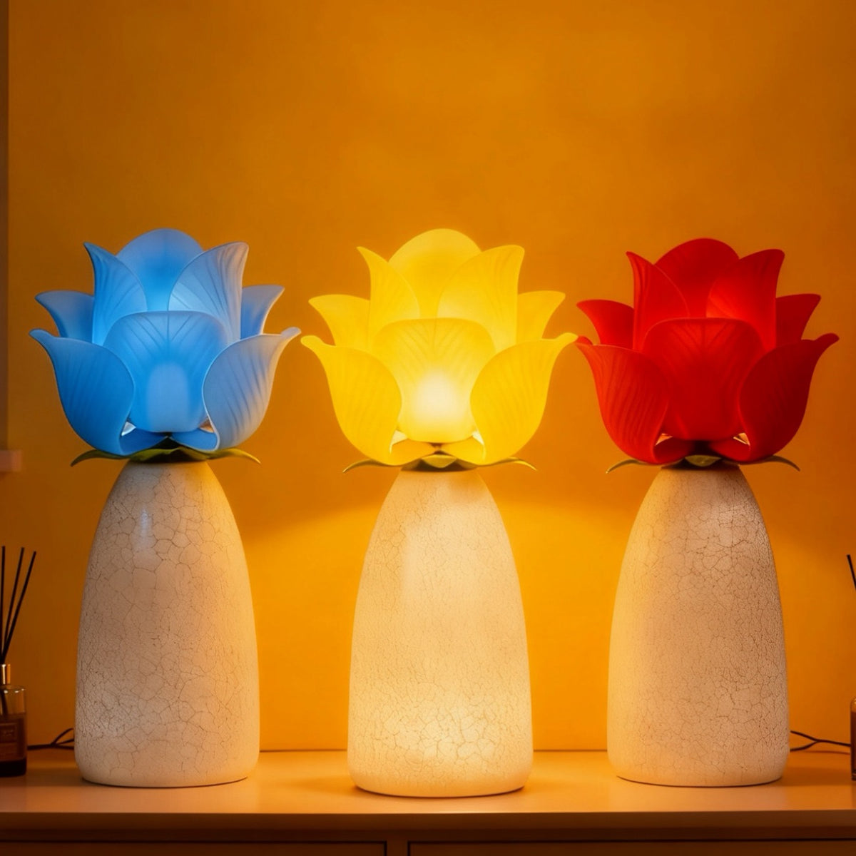 Blooming rose lamps in blue, yellow and red glowing together