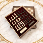 Walnut chess board open showing red-lined interior with pieces stored
